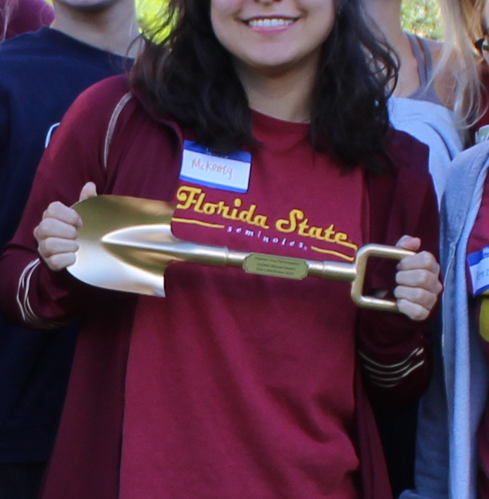 golden shovel statue