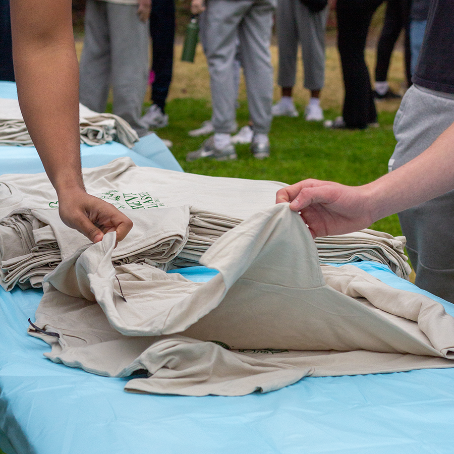 stack of t-shirts on a table